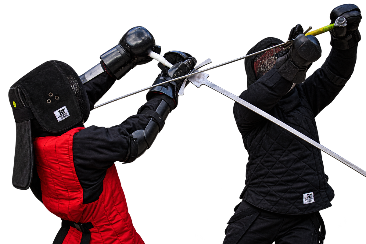 Two fencers meeting in the bind during a longsword bout